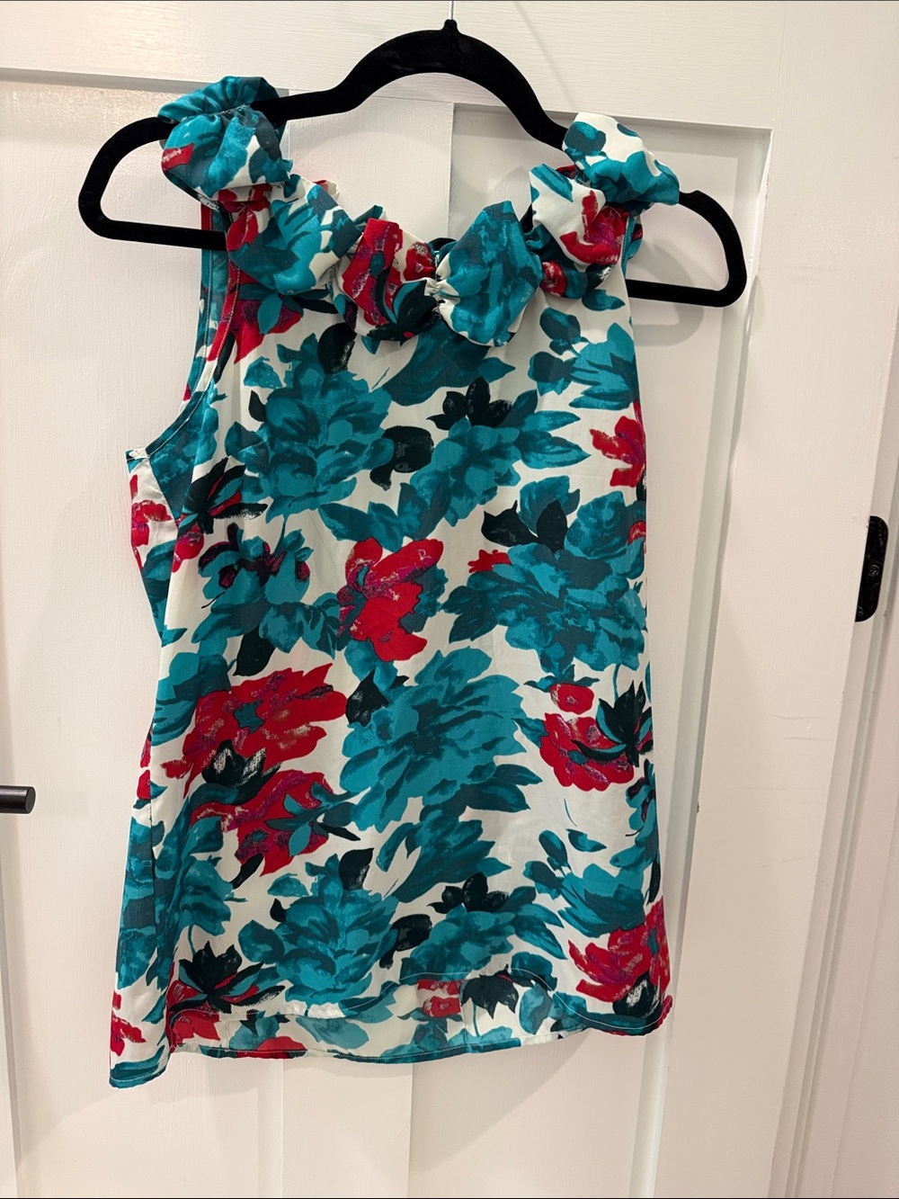 The Limited Floral Ruffle-Neck Tank Top in Teal, Red, White